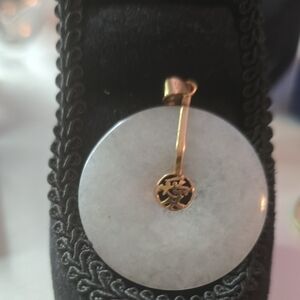 Elegant Gold and White Pendant